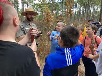 UNCP alumnus Zachary Lunn teaches children about wildlife