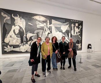 Carla Rokes, left, Vivian Jacbson, Jessica Plessinger, Monika Czartoszewski and Kathy Ertz in front of Guernica by Pablo Picasso at the Museum Reina Sofia 