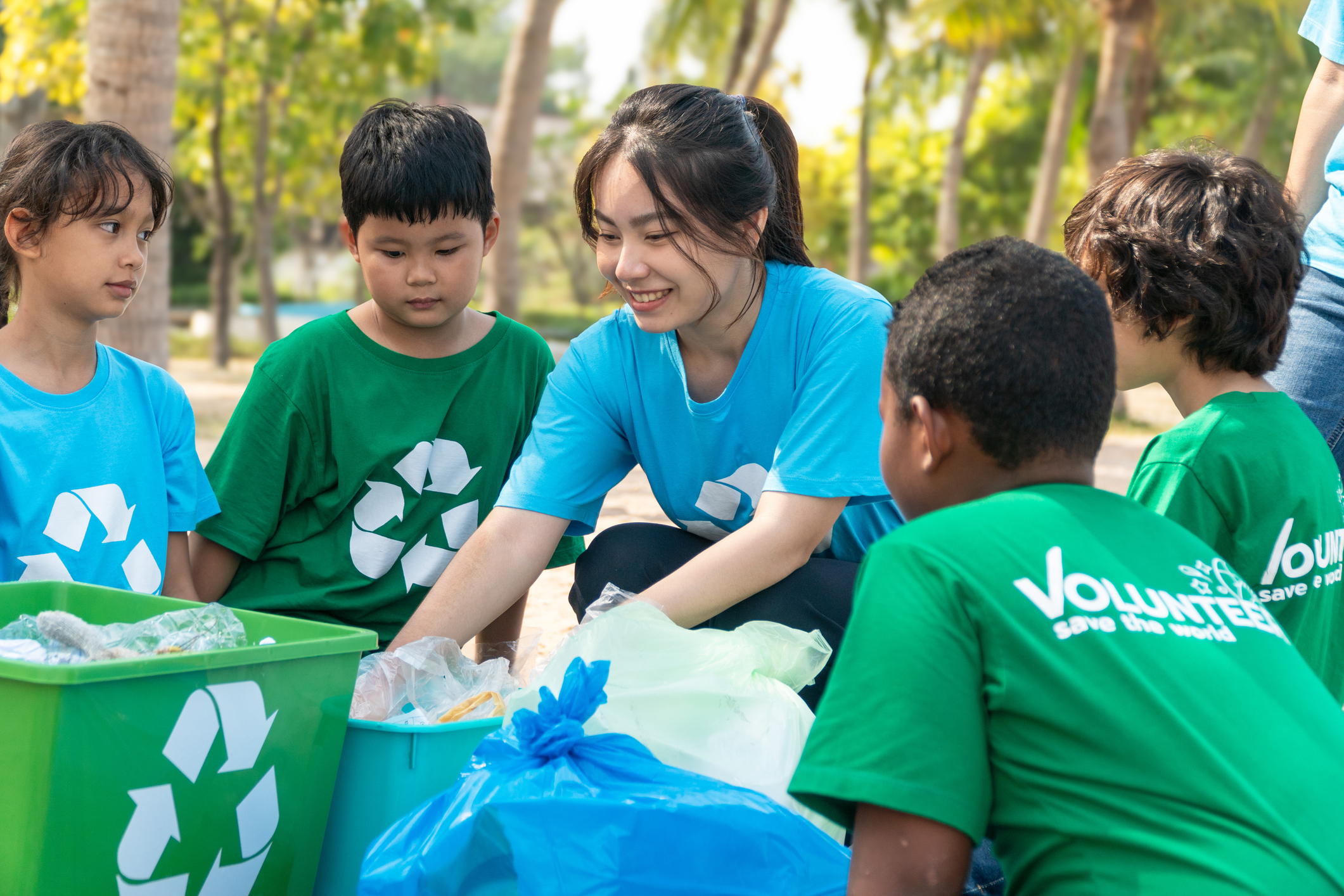 Social worker cleaning up with students