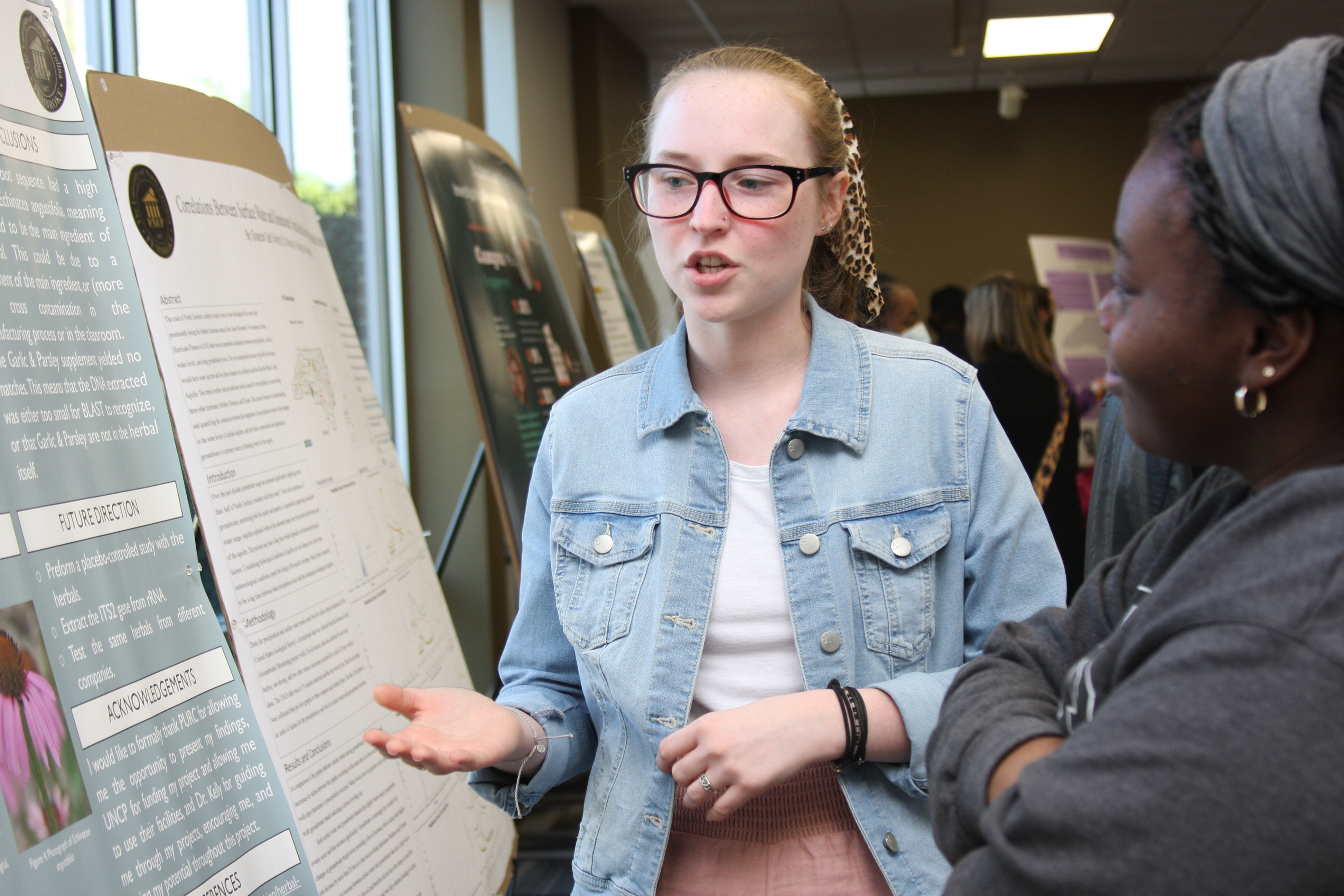 Undergraduate researchers Minh Giang (left) and Ashton Tillett