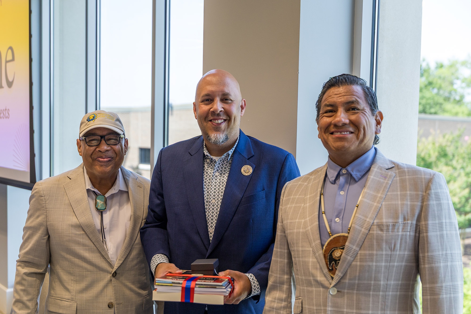 Leaders participating in the Native American Coalition for Economic Prosperity's Government-to-Government Roundtable gather for a photo at UNC Pembroke during discussions focused on tribal economic development, federal partnerships and opportunities for Native communities across the country.