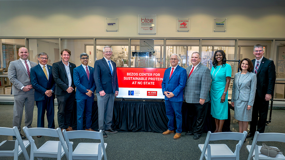 (left to right) Dr. Jim Pfaendtner, NC State, Dr. Robin Gary Cummings, UNCP Chancellor, Andy Jarvis, The Bezos Earth Fund, Dr. Rohan Shirwaiker, NC State, Dr. Andrew Steer, president/CEO of the Bezos Earth Fund, Dr. Randy Woodson, NC State Chancellor, Dr. William Aimutis NC Food Innovation Lab, Dr. Chavonda Jacobs-Young, USDA, Toni Bucci, Sable Fermentation, Dr. Garey Fox, NC State