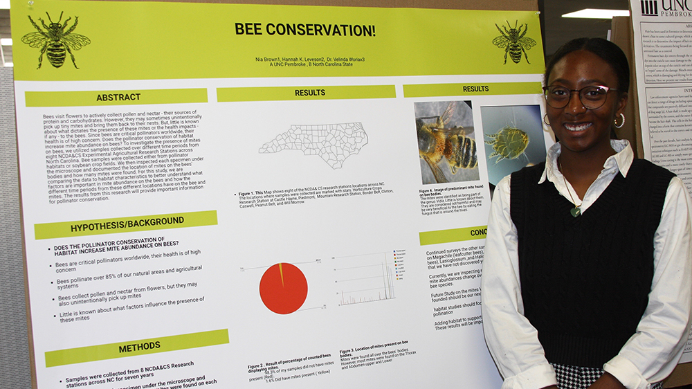Nia Brown is shown presenting her research during the 2023 UNCP PURC symposium