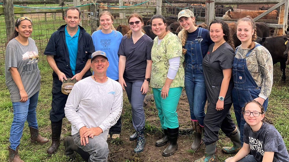Dr. Nico Negrin Pereira (standing second from left) and his research team