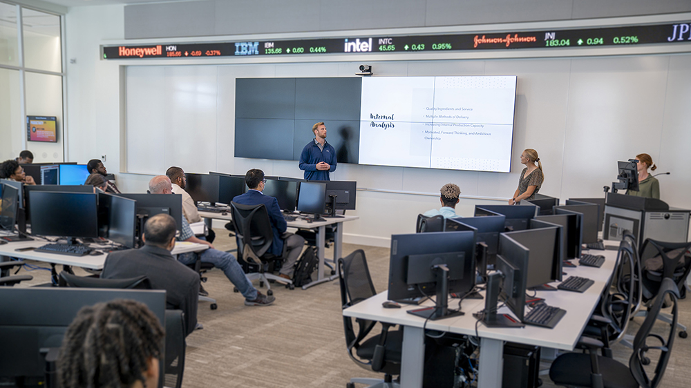 UNCP students in the trading room at the Thomas College of Business