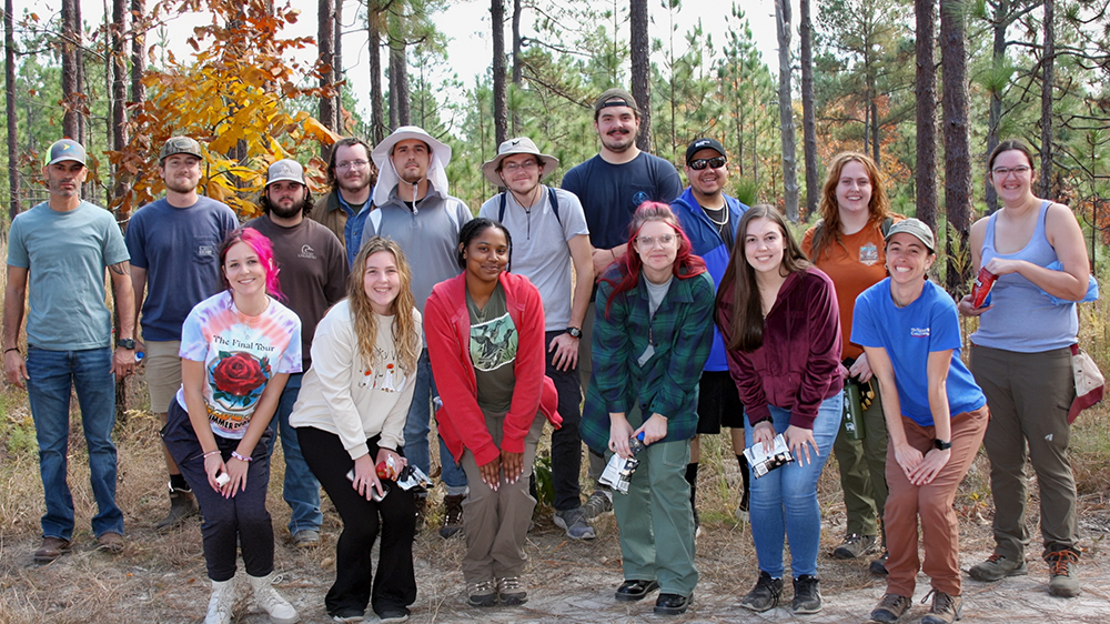 Conservation Biology students and TNC staff member Sarah Hecocks (first row, wearing a hat)