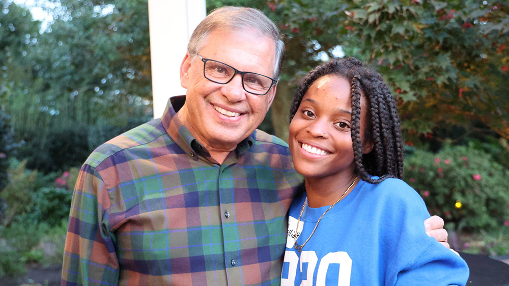 Armani Jones-Elliott with Chancellor Robin Gary Cummings during a recent campus event