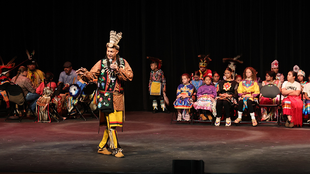 John Oxendine performs onstage at the Lumbee Tribal Cultural Showcase