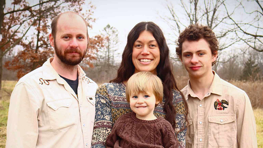 Family photo (left to right): Zachary, wife Blair (holding son Luke), and son Ethan