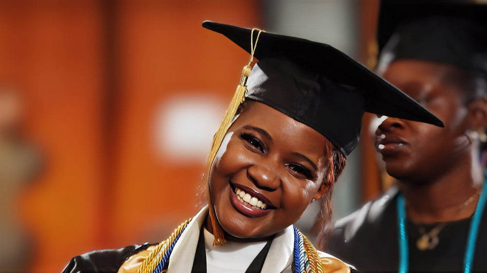 Alumna Anesu Mavhiya attends commencement