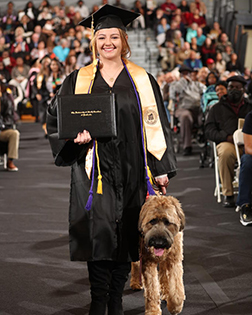 Mical Mosier with her service dog Archie