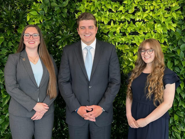 Aspen Andersson with classmates Samuel Robinson and Raven Sizemore.