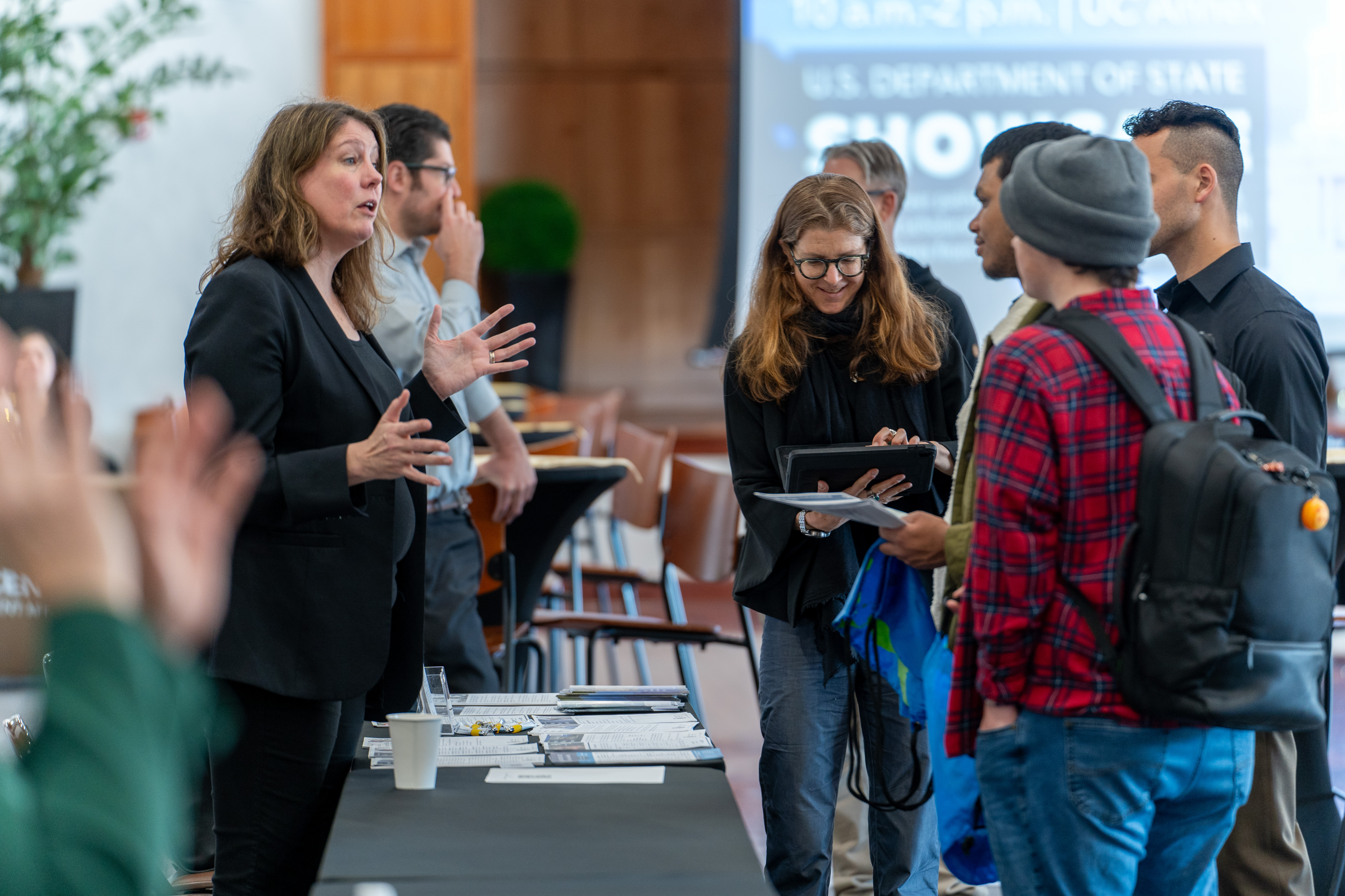 US Department of State agents engage with students during a career showcase