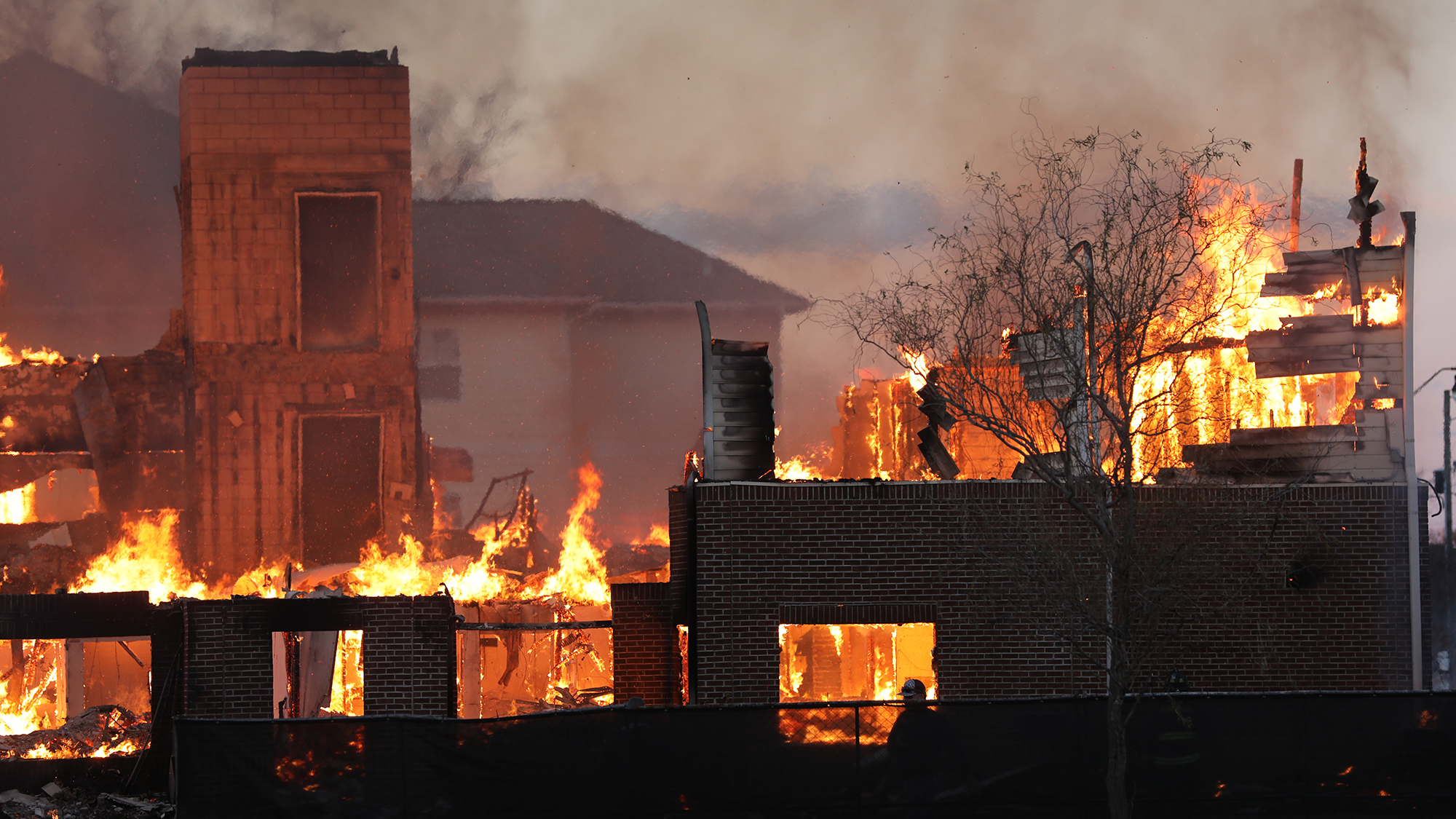 Village Apartments engulfed in flames