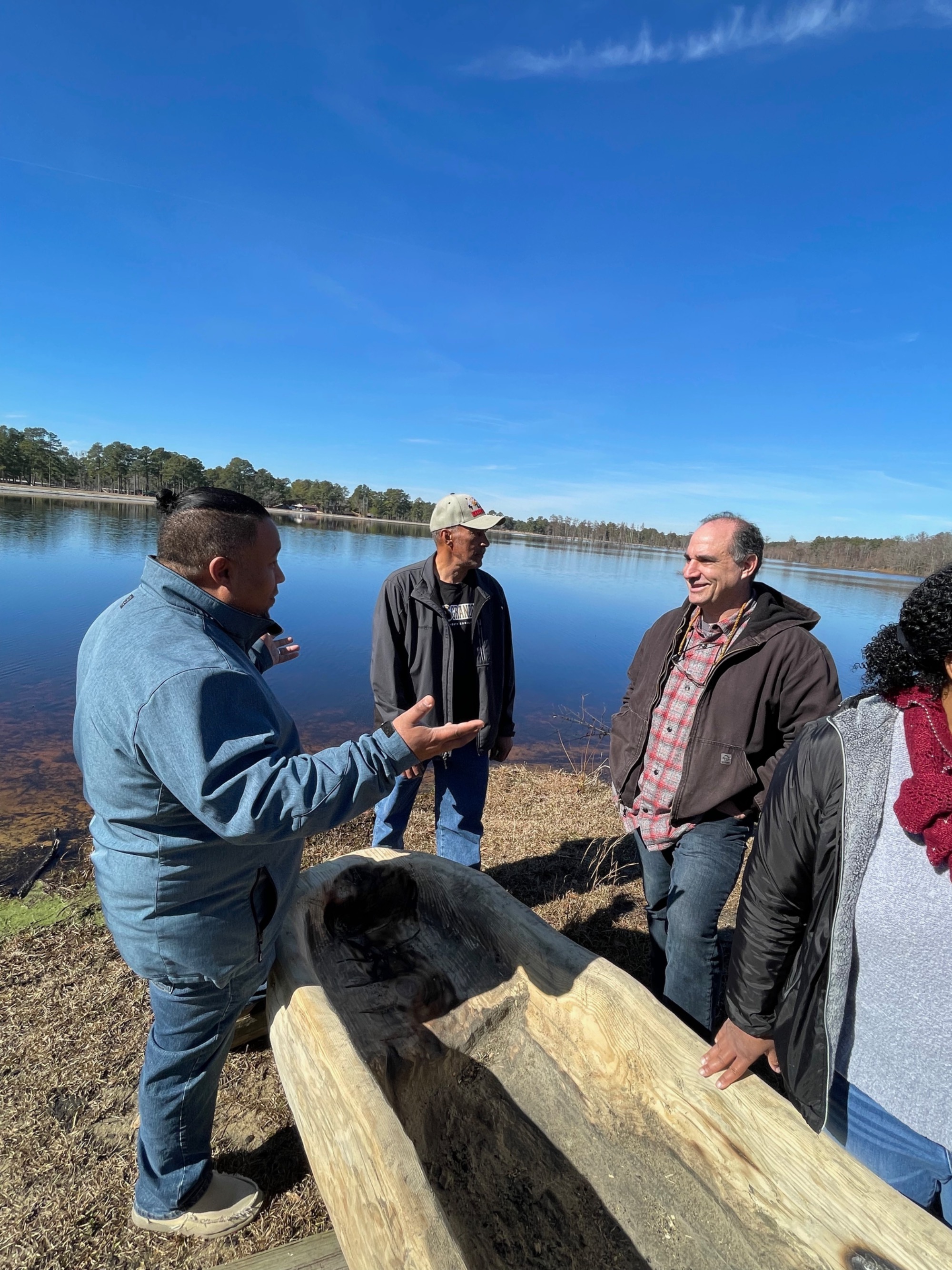 Harlan Chavis explains the process to the Nature Conservancy representatives.
