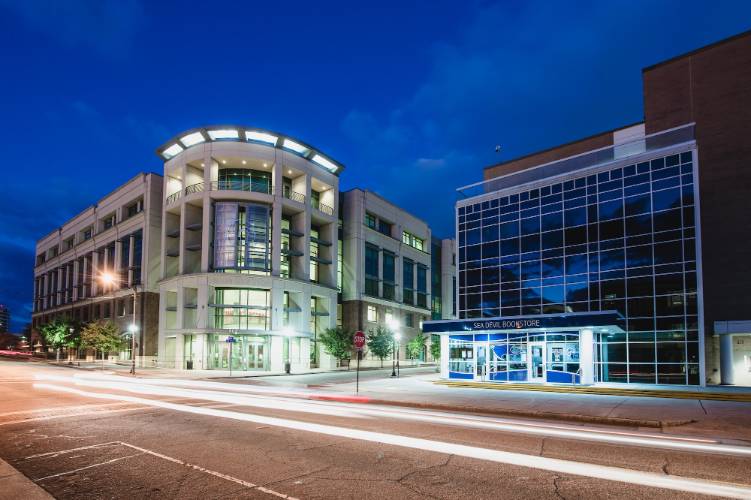 The front of Cape Fear Community College campus buildings at night