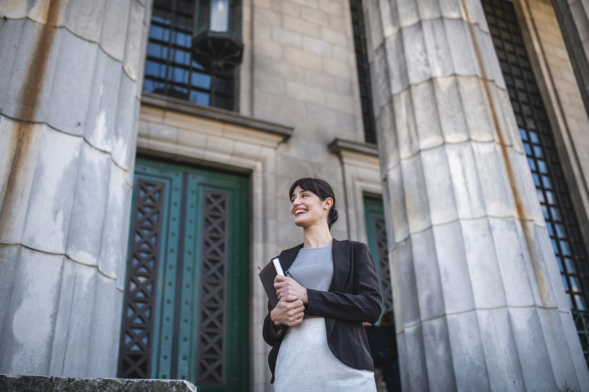 woman on courthouse steps