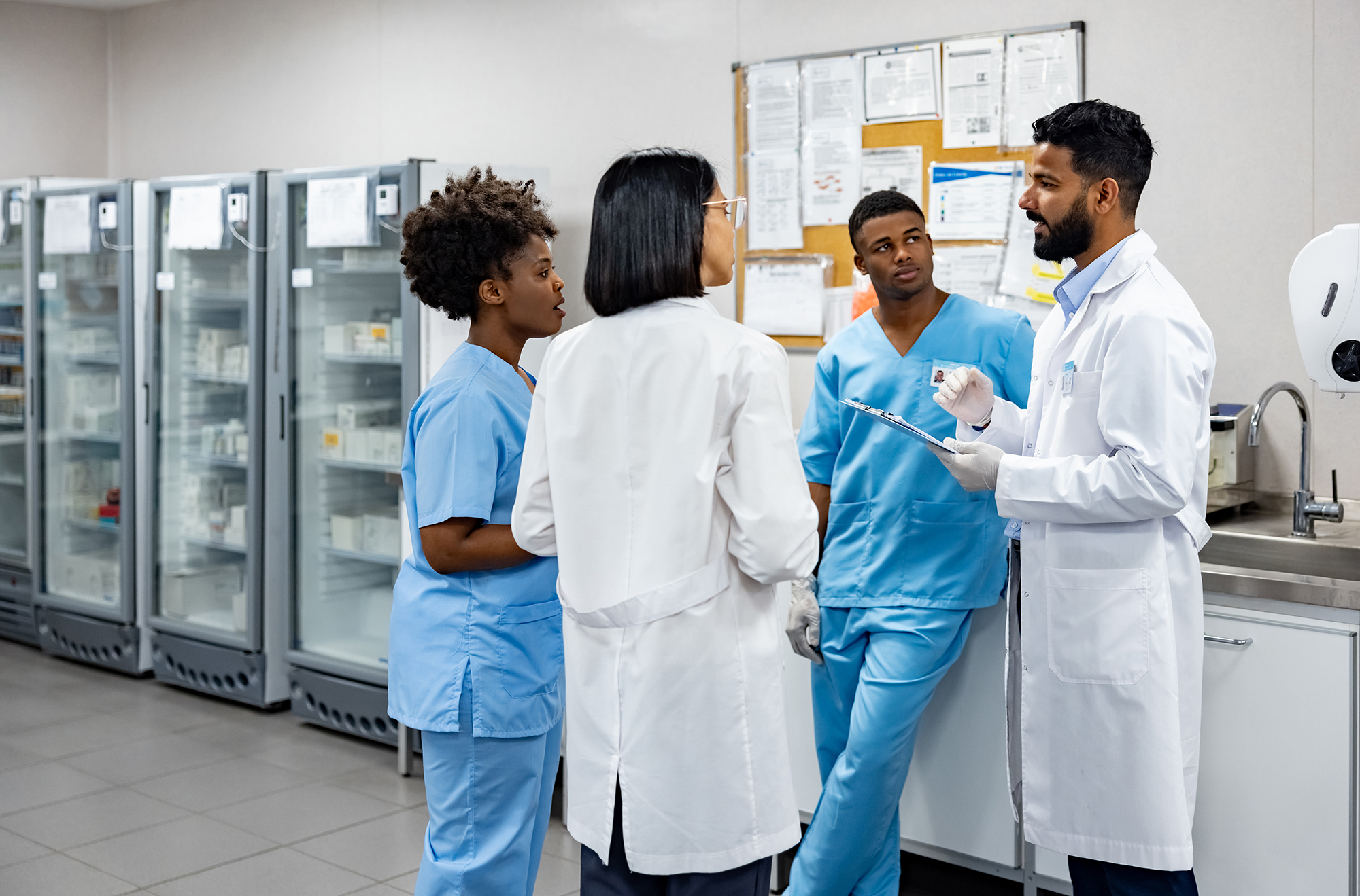 group of hospital workers standing and talking