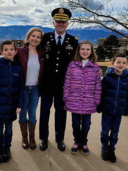 Johathan Falk with his wife, daughter, and two sons