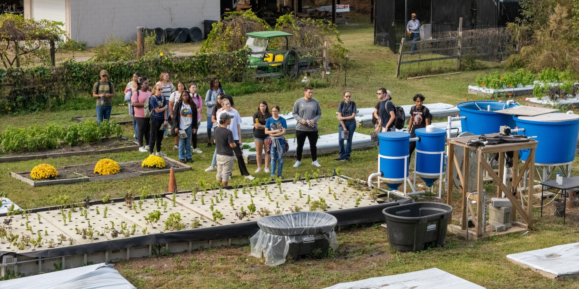 Students exploring the Campus Garden at UNC Pembroke