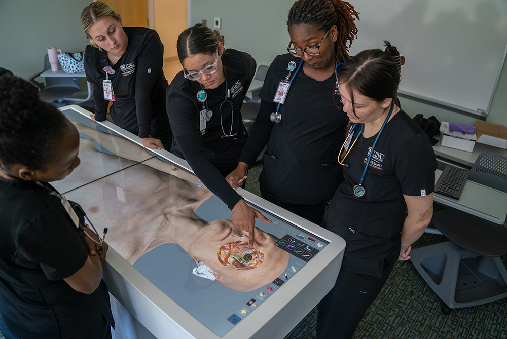 UNCP nursing students with the anatomage table