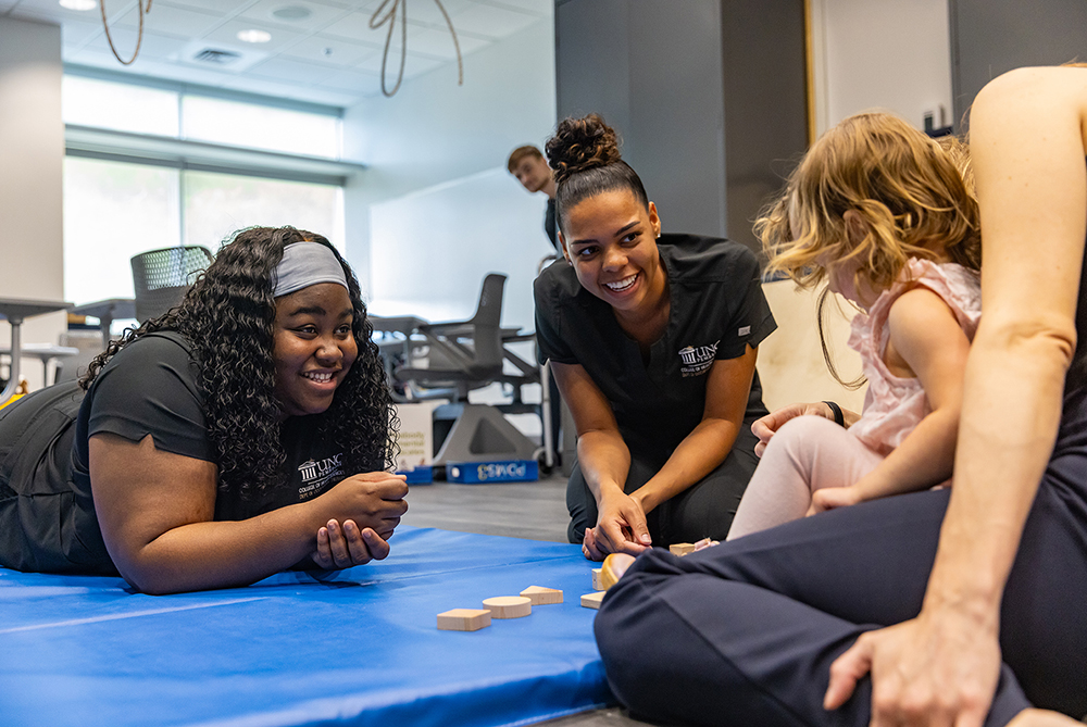 two UNCP students in Occupational Therapy Class