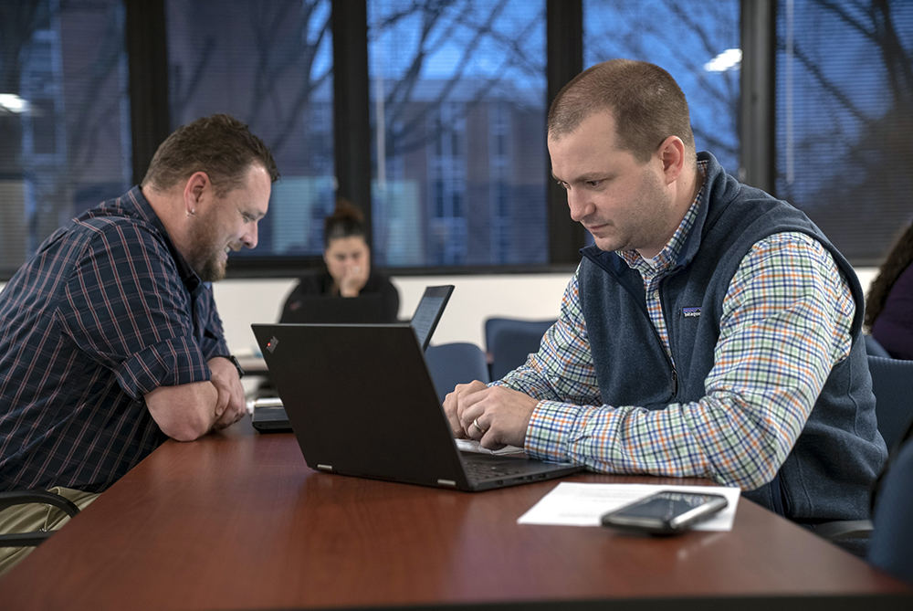 Graduate students in class