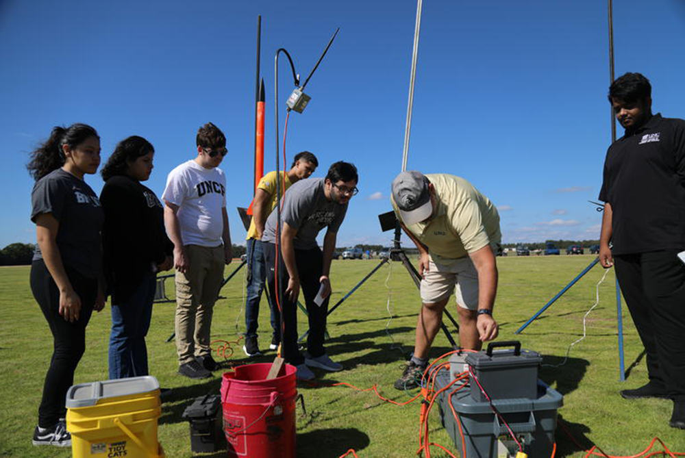 UNCP students launching a small rocket