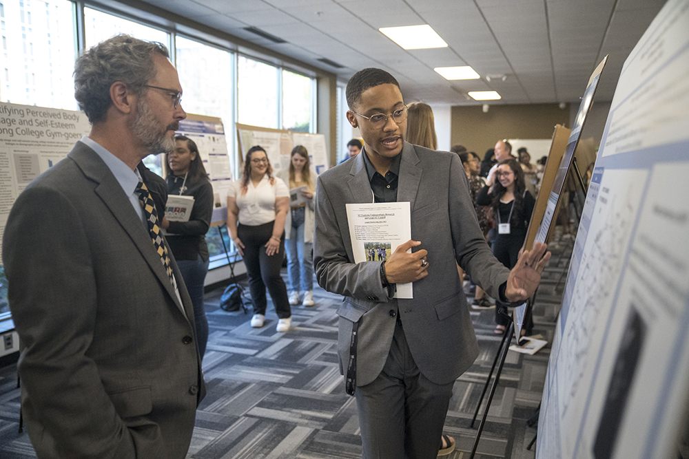 student presents research at PURC symposium