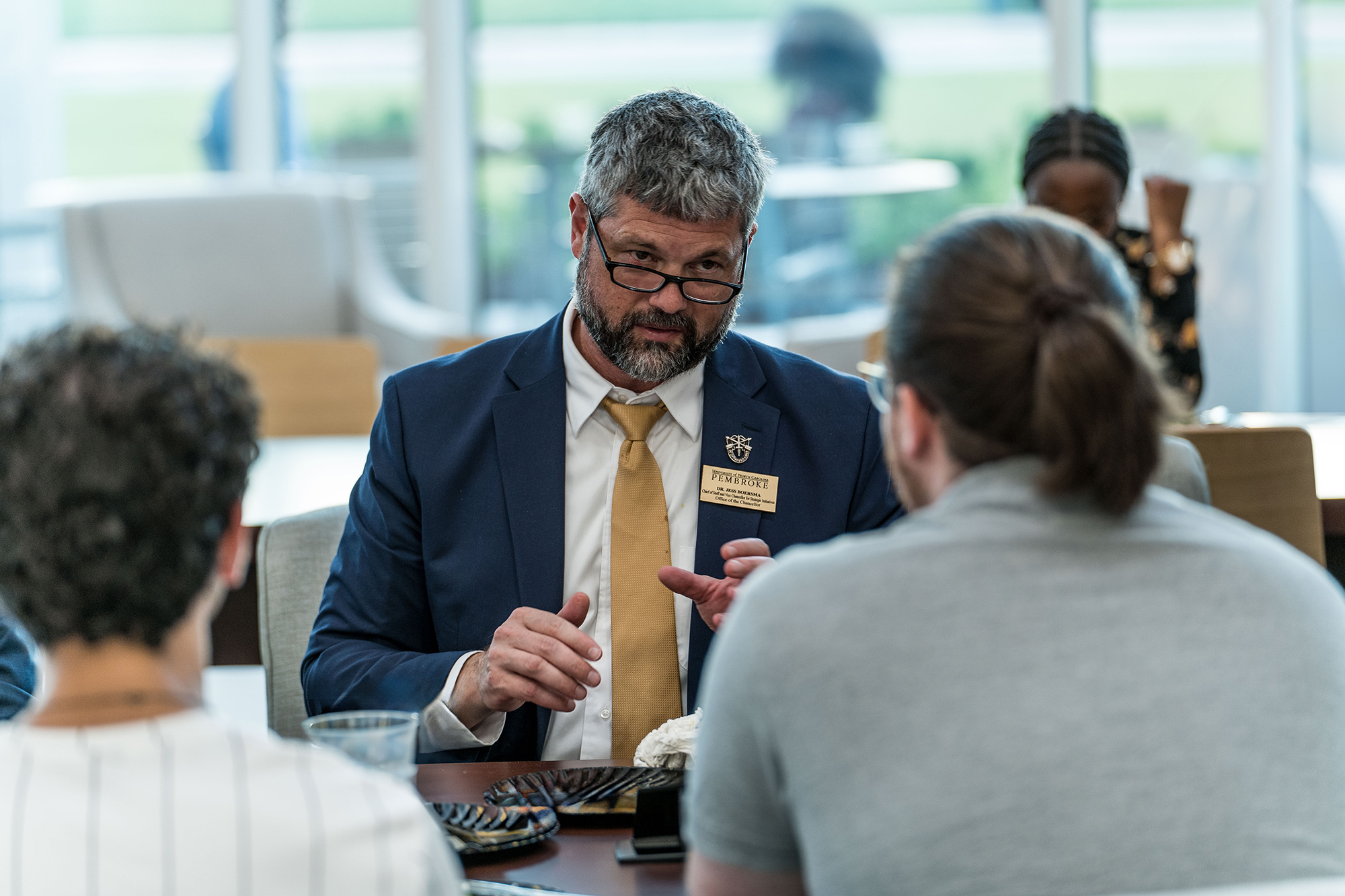 UNCP Chief of Staff Jess Boersma, PhD, leads a group talk