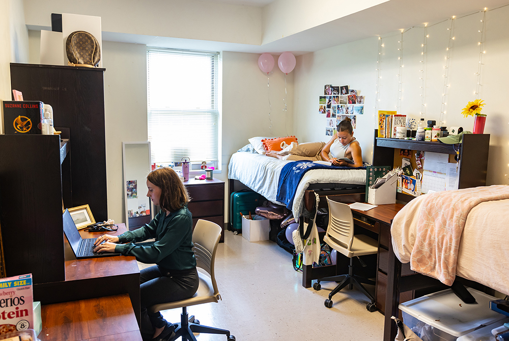 two UNCP students in a dorm room