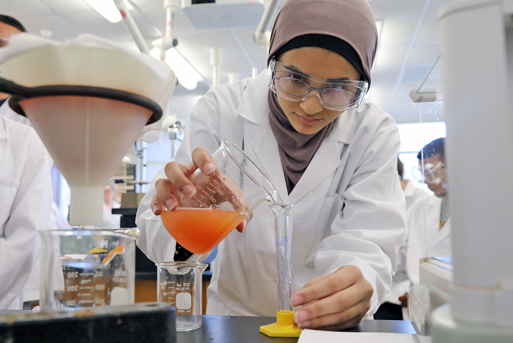 UNCP student conducting experiments