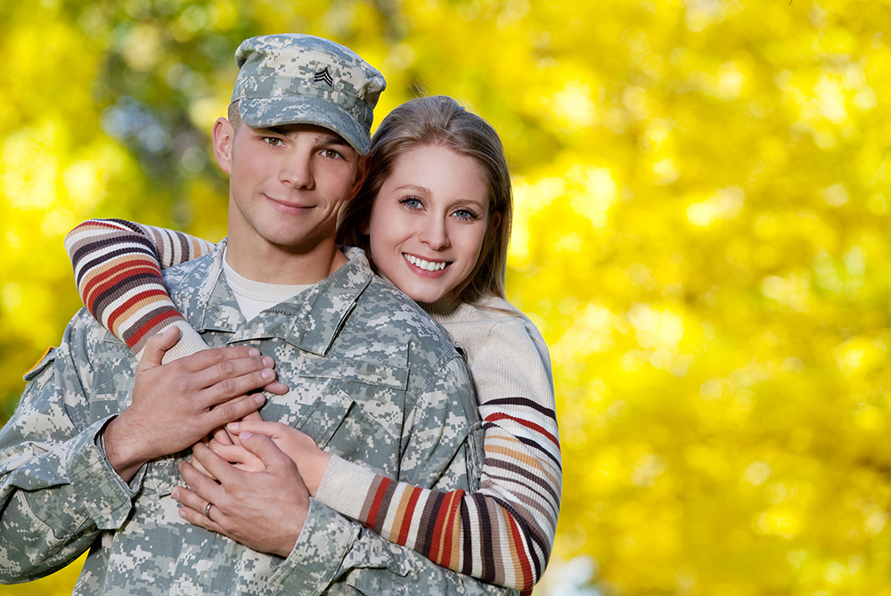 man in military uniform with his wife
