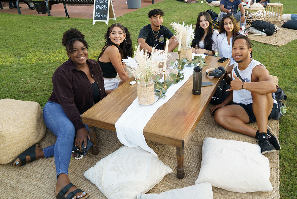 UNCP students on lawn at an event