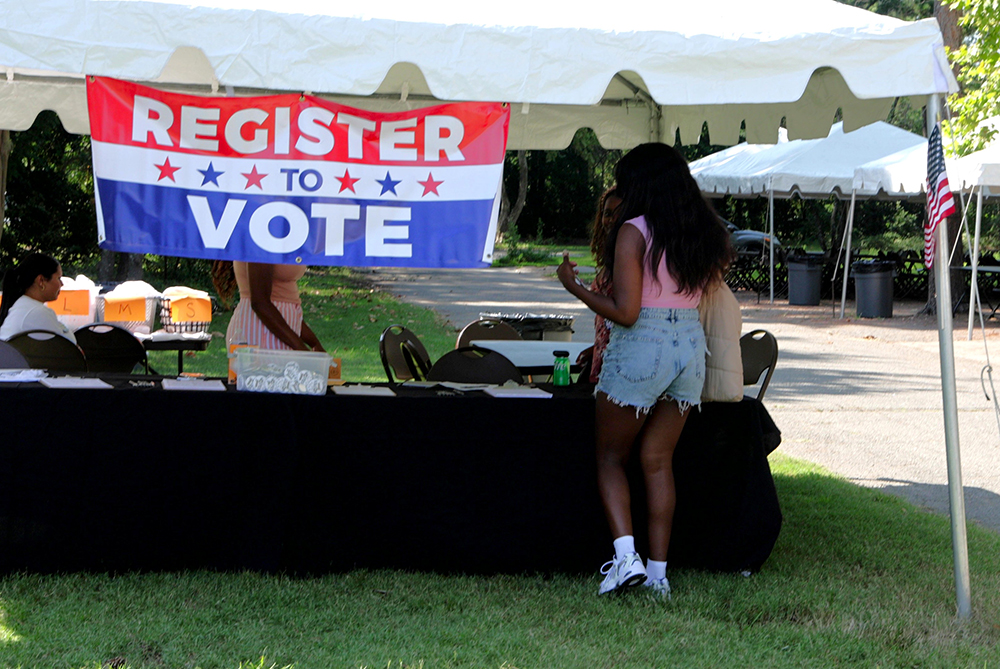 Voter registration at a student event on campus at UNC Pembroke.