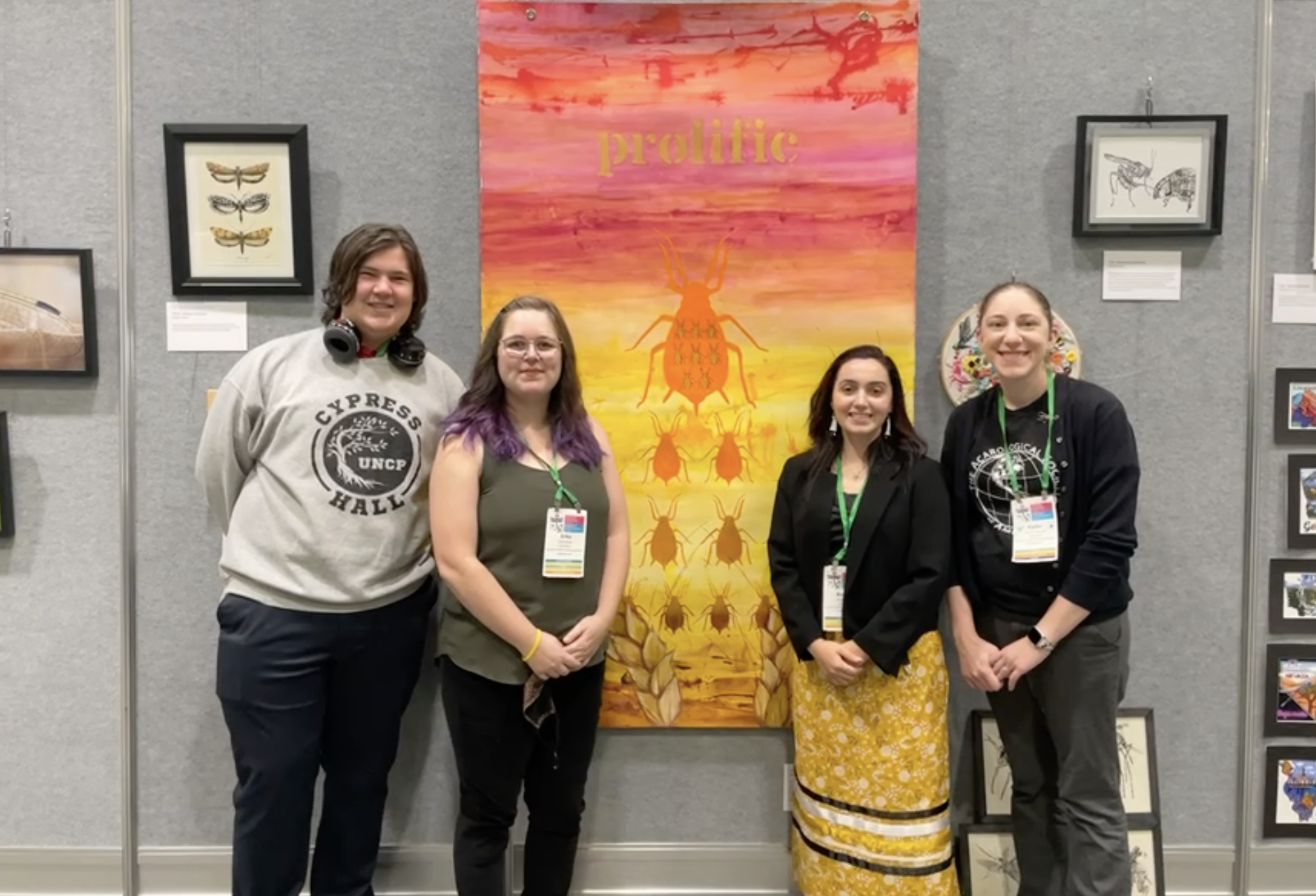 students posing for a photo with their mentor 