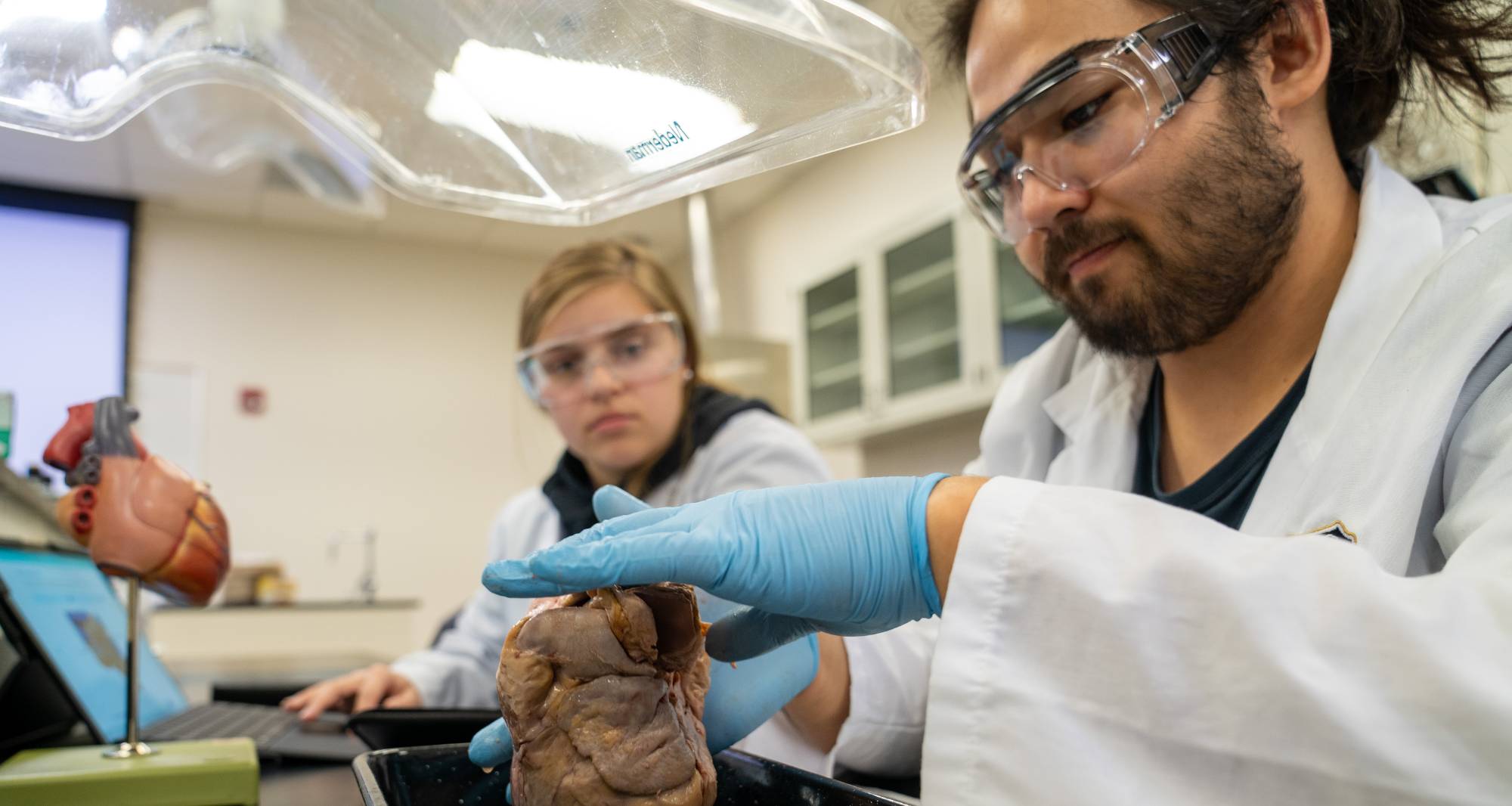 UNCP biology students with a heart