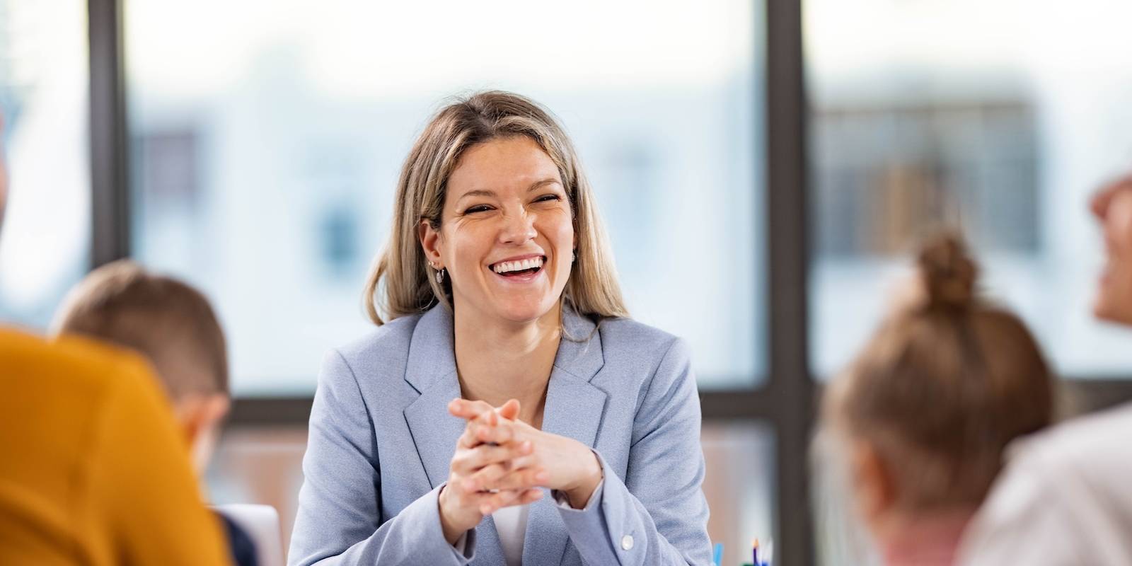 school administrator talking to family