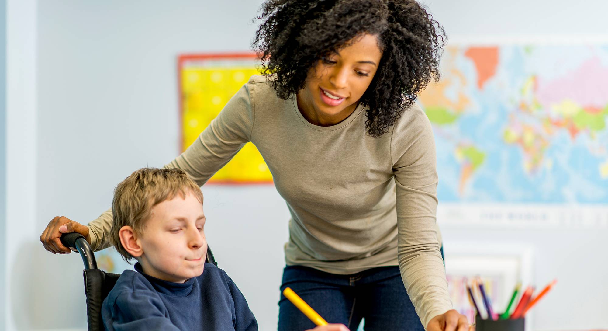 special education teacher with a student
