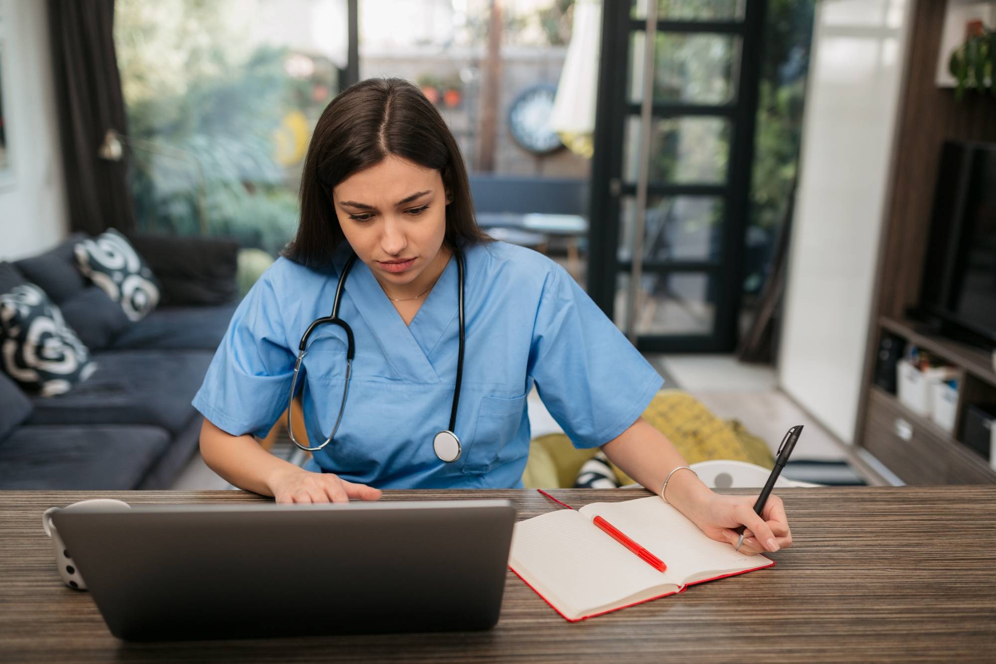 Healthcare worker on laptop