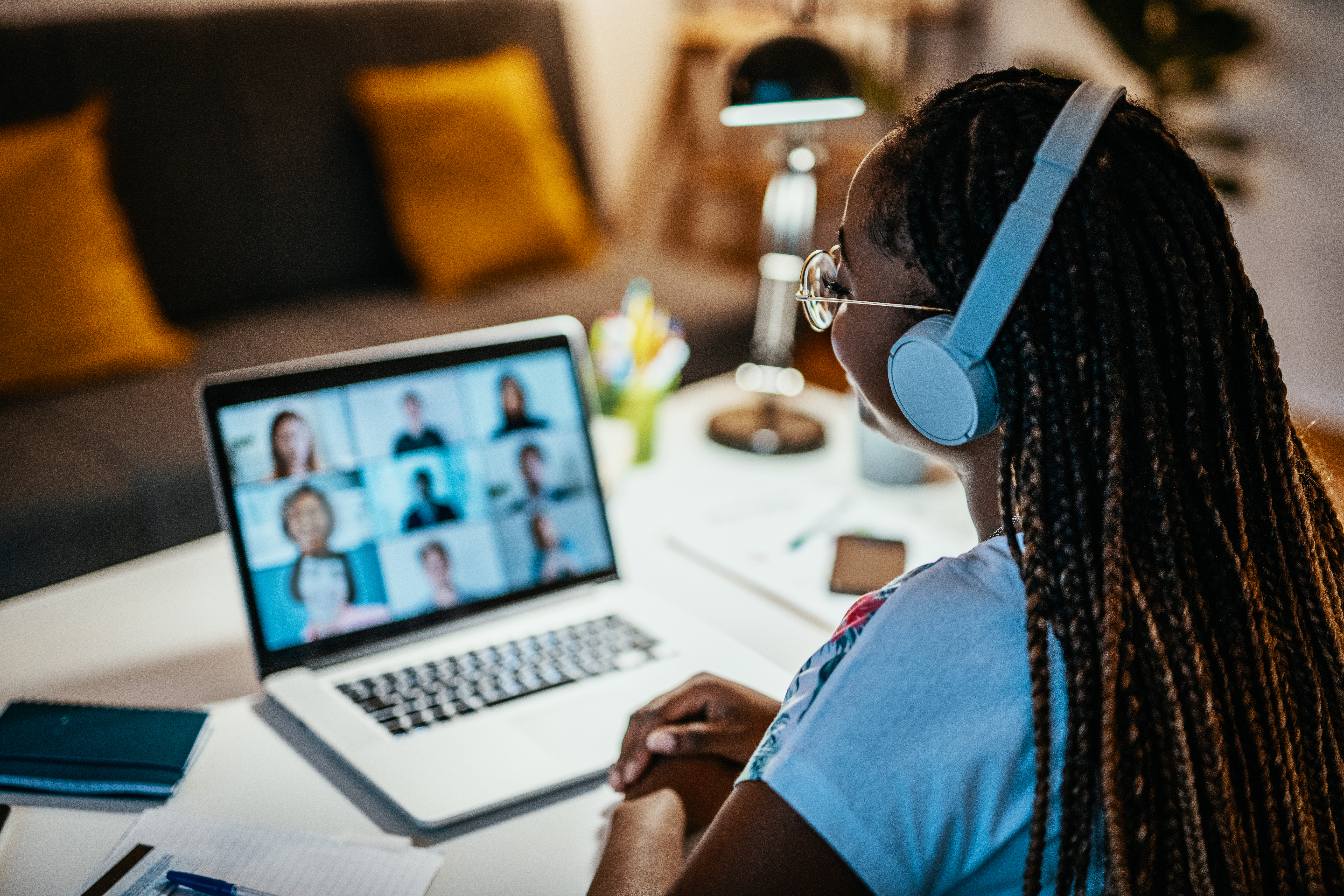 student on computer on a meeting