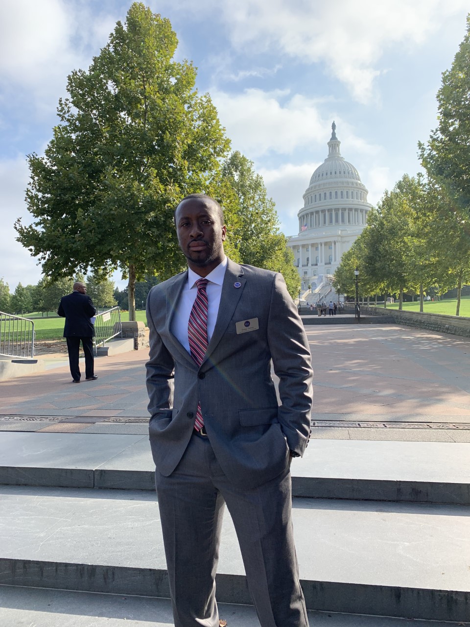 Darius Barnes standing in front of a capital building