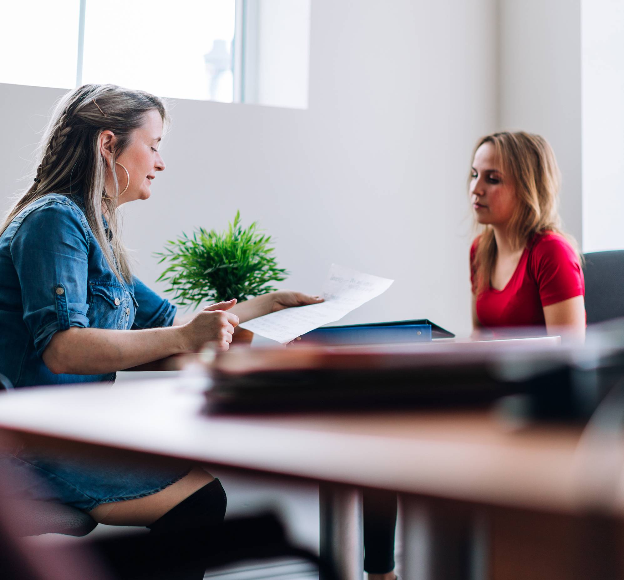 woman and student counseling social work school