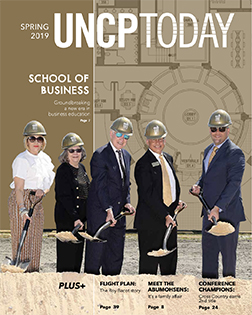 chancellor and others breaking ground from the cover of the UNCP today spring 2019 edition