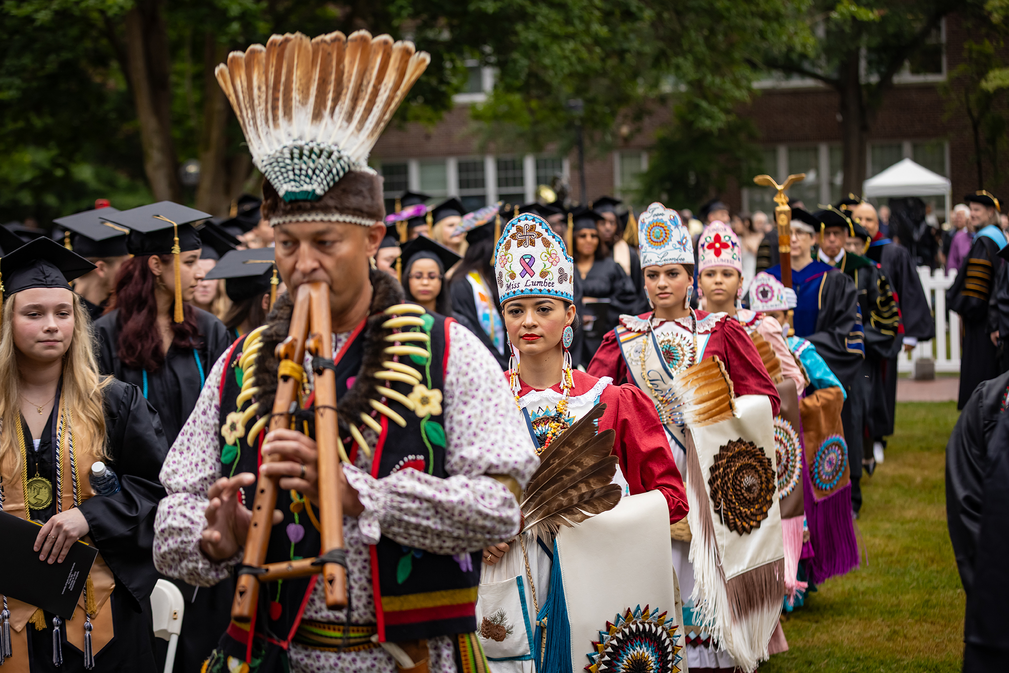 The Lumbee Ambassadors lead in the 2026 UNCP processional