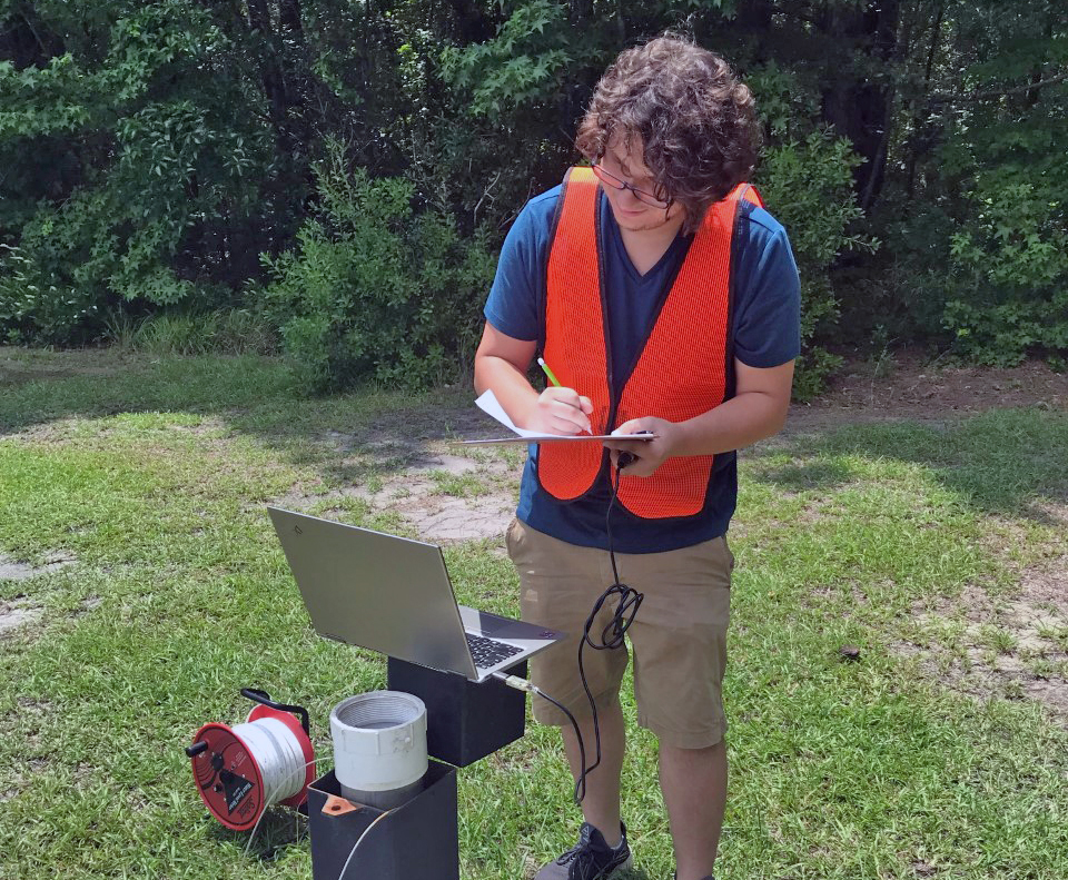 geology geography student doing fieldwork