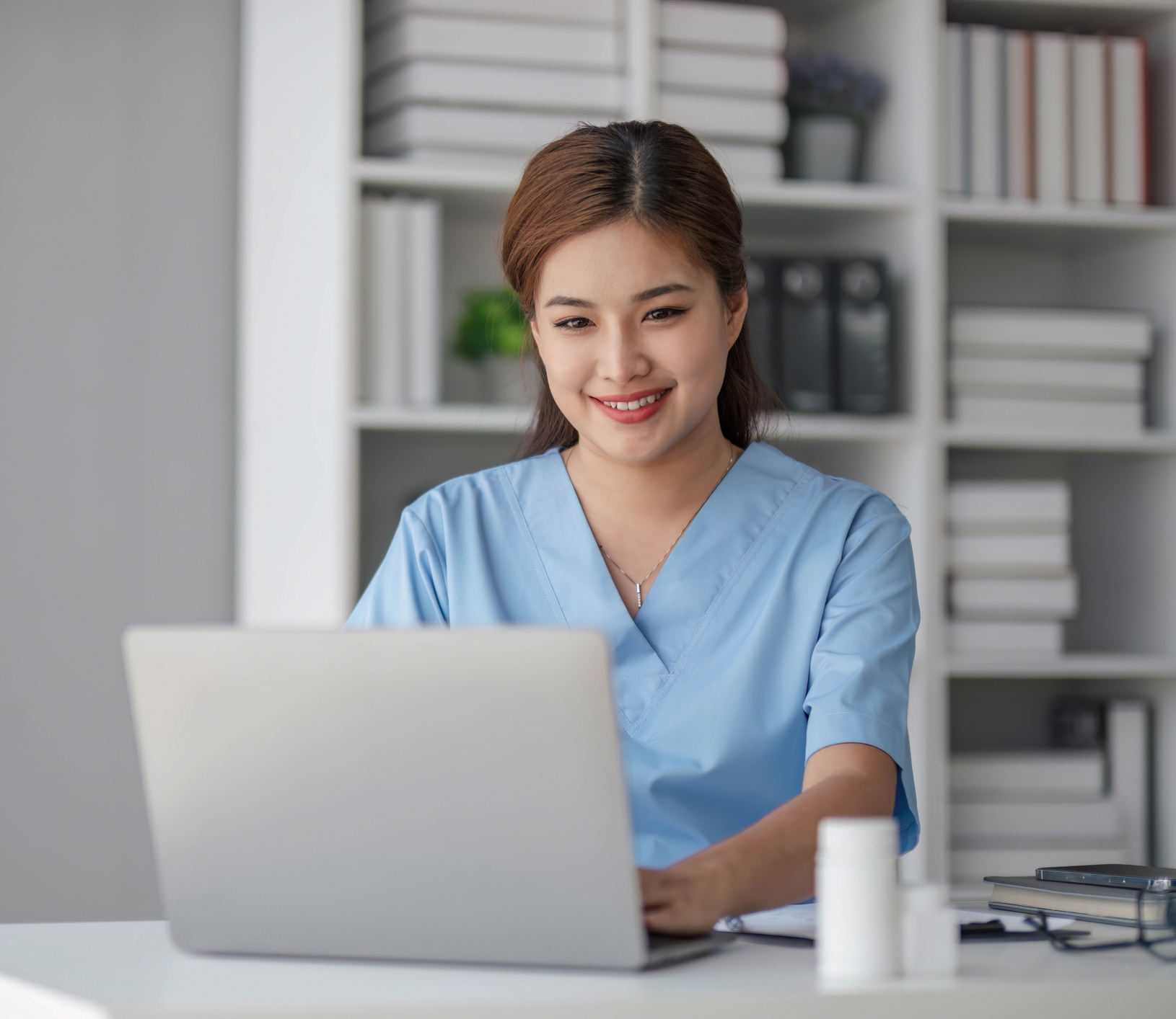 healthcare woman on laptop