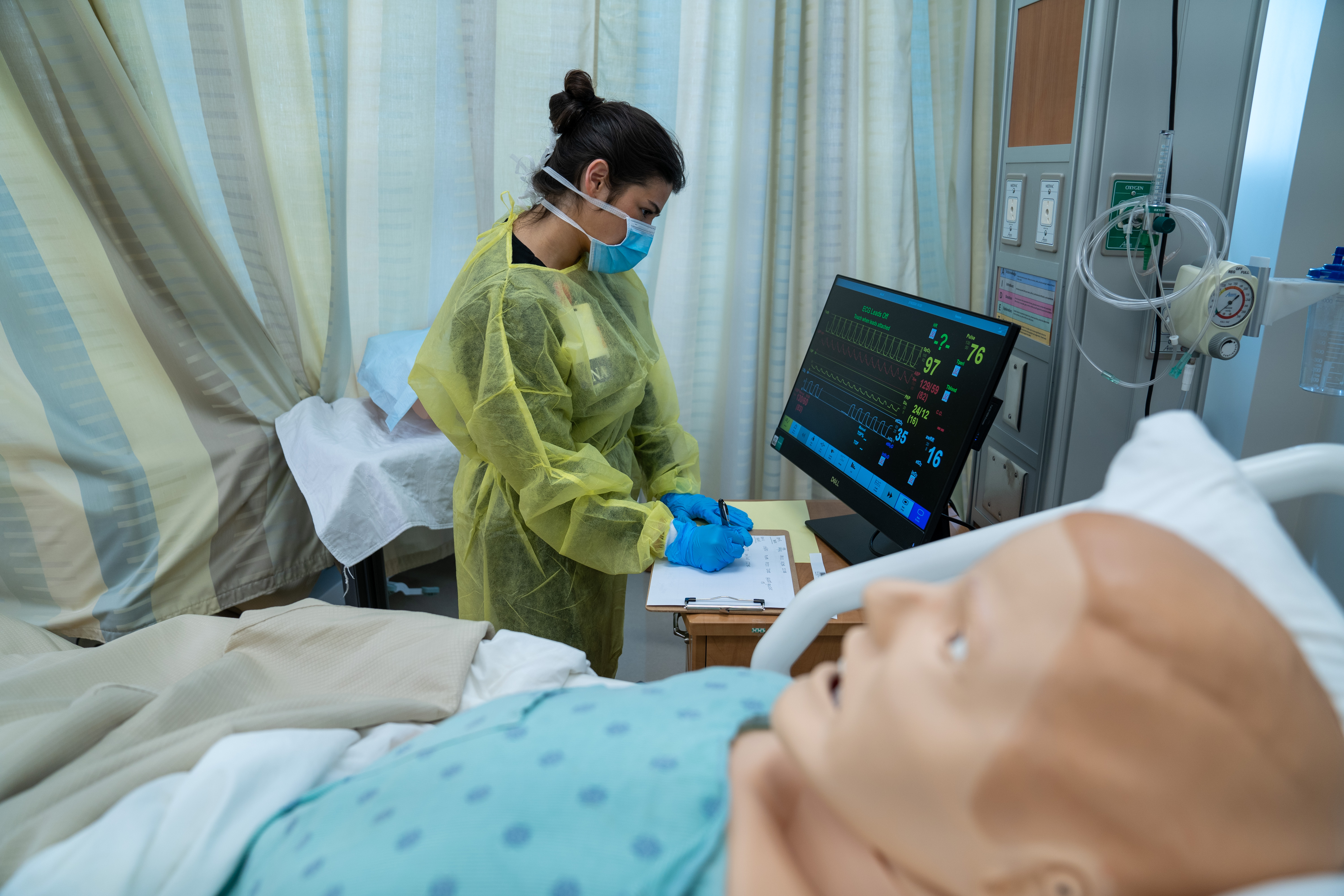 female nursing student with manekin at UNCP