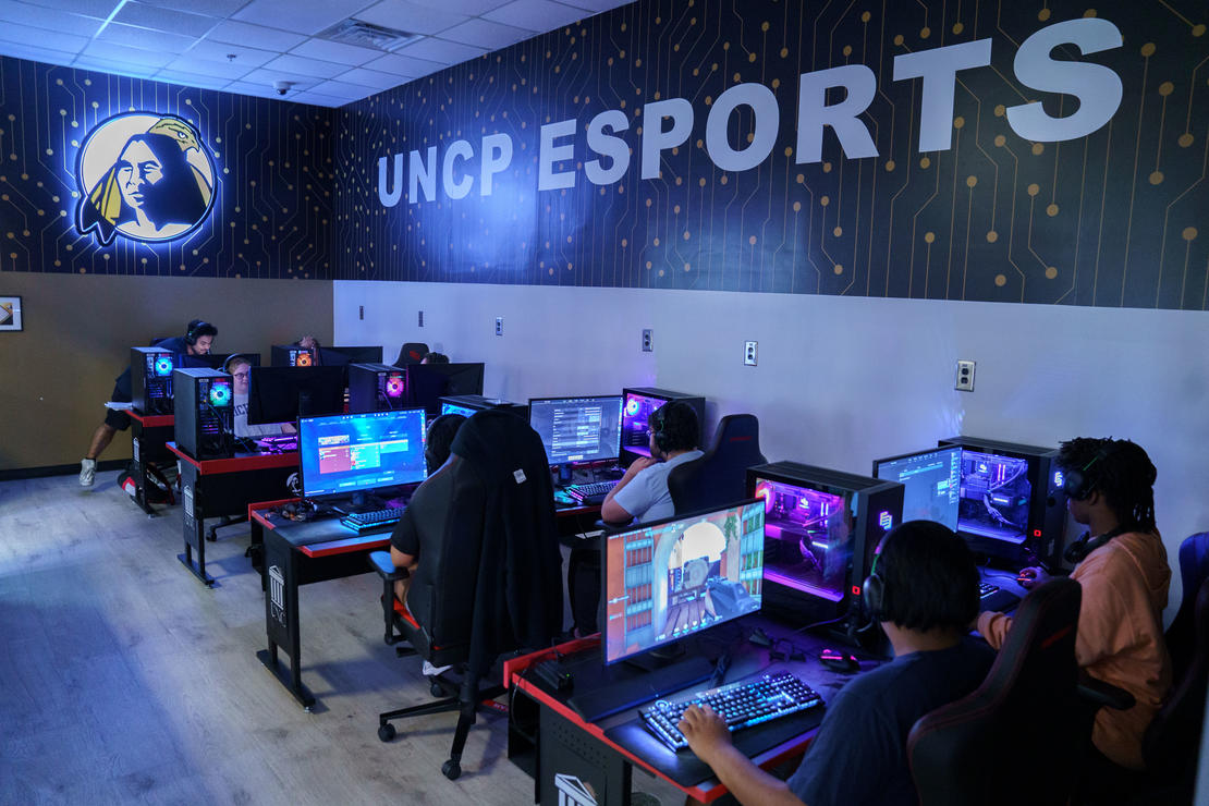 Students playing video games in the Esports Arena