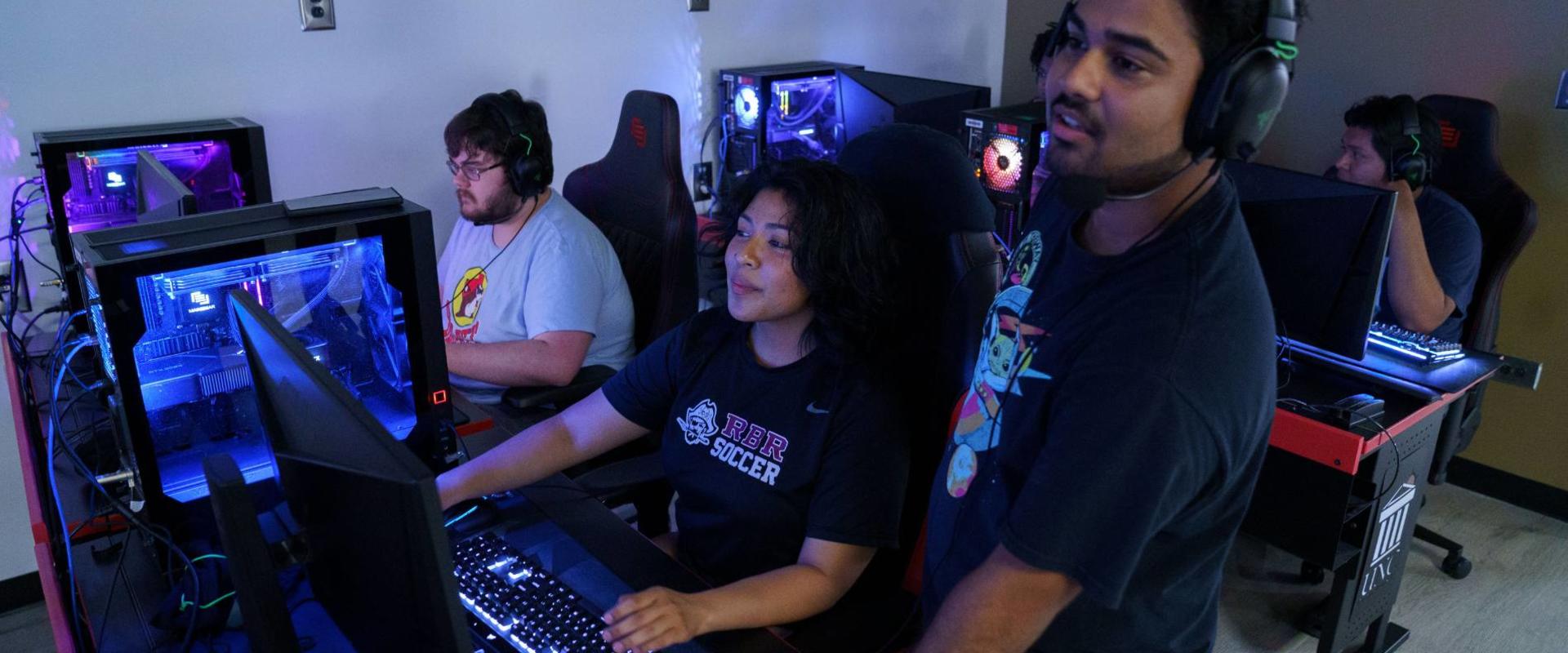 UNCP Students work in the e-sports arena on computers.